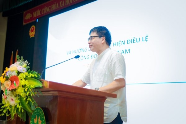 Ông Nguyễn Ngọc Ân - Phó Chủ tịch Công đoàn Giáo dục Việt Nam, Chủ nhiệm UBKT Công đoàn Giáo dục Việt Nam trình bày tại Hội nghị