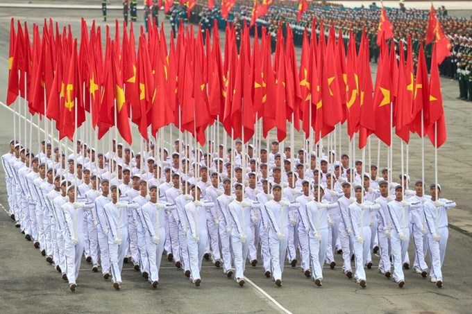 Rước cờ Tổ quốc trong Lễ diễu binh, diễu hành mừng chiến thắng 30 tháng 4 (Ảnh sưu tầm)